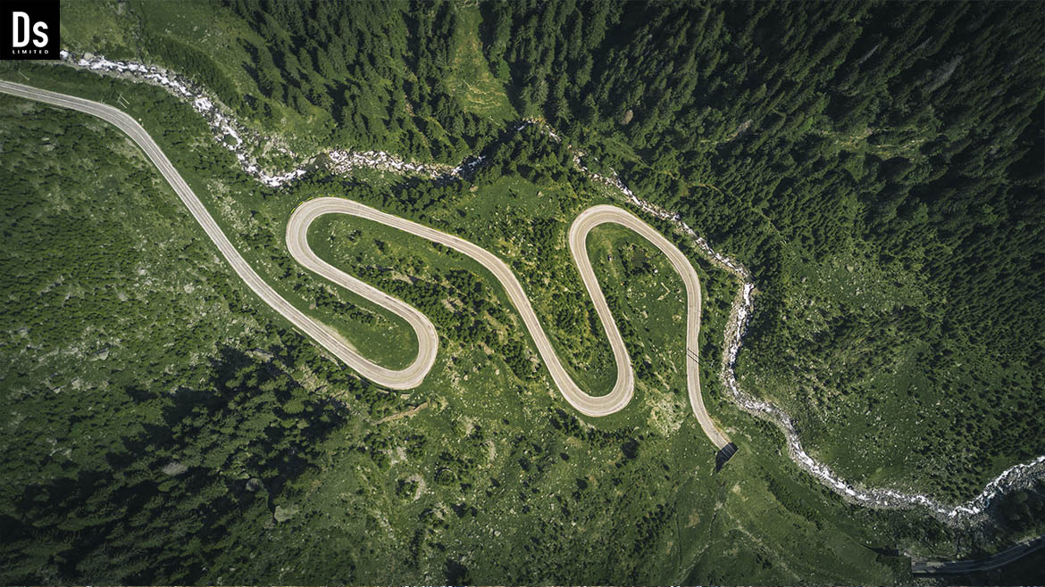 At the summit of the Transfagarasan road, holding a steaming cup of coffee, Denys Dynamics found himself immersed in deep reflection. He had long envisioned this moment, imagining how it would feel to finally be here, where reality met his dreams. And now, amidst the majestic mountains, surrounded by breathtaking landscapes that seemed crafted just for him, he was living that dream.  Every detail of the moment was infused with magic. He watched as sunlight danced upon the road, shimmering and flowing like a magical stream of light. The gentle wind brushed against his face, whispering secrets and promises of new adventures. In his heart, he felt not just joy, but a profound sense of satisfaction and connection to the world.  Thoughts of how he had dreamed of this journey flickered through his mind, how he had visualized every twist of the road and every green-cloaked peak. Now, sitting here, he realized that all those dreams had come true. This was not merely a trip; it was a gift from fate, a moment he would cherish forever.  Time seemed to stand still, and he wished for this moment to last. Taking a deep breath of the fresh air, filled with the scents of pine and earth, he closed his eyes again, allowing himself to revel in the feeling that magic had occurred, that he was truly here, at the summit where dreams come alive.